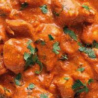 Butter Chicken · Chicken cooked with spices, herbs and butter sauce.