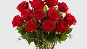 Long Stem Red Rose Bouquet By Ftd · Nothing speaks of love so much as a bouquet of beautiful long stem red roses. Arranged with seeded eucalyptus in a classic glass vase, this bouquet is a gift to her heart from yours.