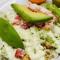 Guaraches · Flat tortilla, layer of beans, steak or chicken, topped with sour cream, cheese and lettuce.
