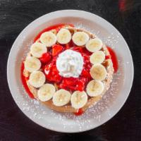 Strawberry & Banana Crepes · Crepes filled with strawberries and bananas.