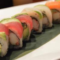 Rainbow Roll · Crabmeat, avocado, and cucumber topped with sliced raw fish and avocado.