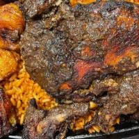 Jollof And Jerk Meal · Comes with a full plate of Jollof rice, Plantains and Jerck chicken quarters