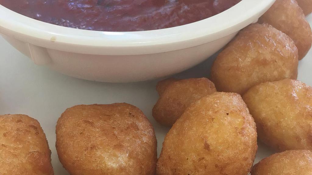 Cheese Curds · Served with marinara sauce.