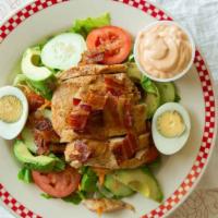 California Cobb · Grilled chicken breast, apple smoked bacon, tomatoes, sliced avocado, red onions and a hard ...