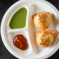 Vegetable Samosas (2 Pieces) · Flaky golden pastries with a choice of vegetables.