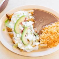 Flautas · Fried chicken rolled in tortillas, topped with lettuce, avocado, cheese, tomatoes, and sour ...