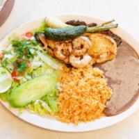 Carne Mixta · Grilled chicken and shrimp, served with rice, beans and pico de gallo, with fresh tortillas.