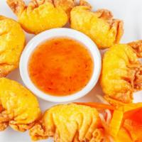6. Crab Rangoon · Cream cheese and crab meat seasoned and wrapped with wonton skins.