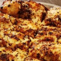 Cheesy Bread · Our House Made Dough Topped With Cheese, Butter, Italian Seasons, & Parmesan Cheese.  Try It...