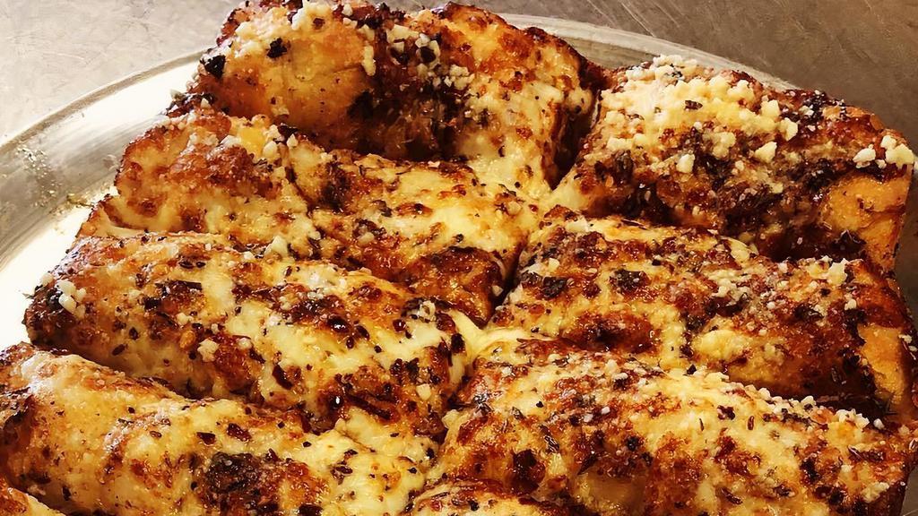 Cheesy Bread · Our House Made Dough Topped With Cheese, Butter, Italian Seasons, & Parmesan Cheese.  Try It With A Side Of Pizza Sauce Or  Cheese Dip!