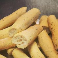 Fresh Made Bread Sticks · Bag Of 10 Garlic Butter Bread Sticks With Parmesan Cheese & Spices.