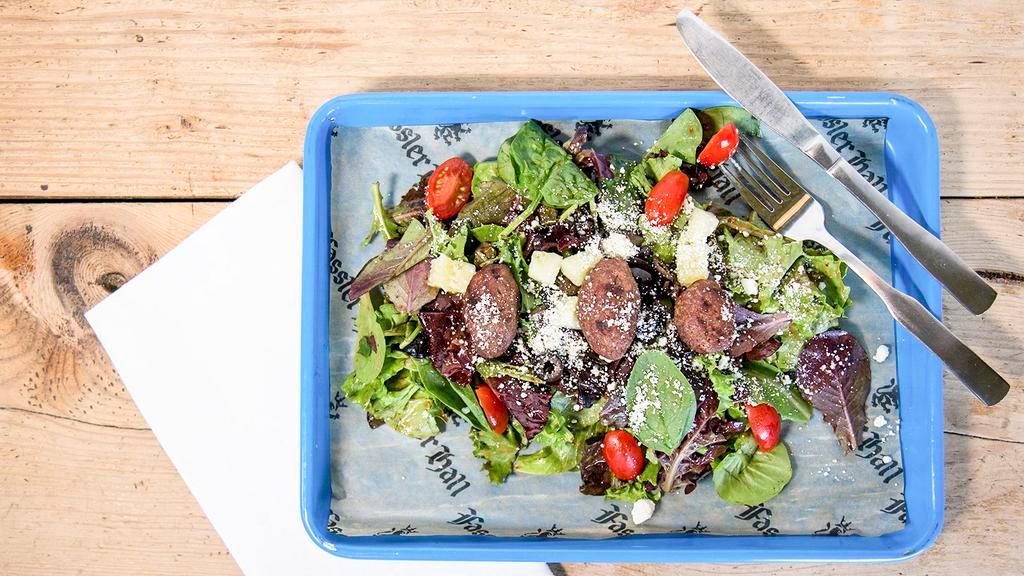 Haus Salad · Mixed greens with cucumber, tomato, black olive, feta, mustard vinaigrette.