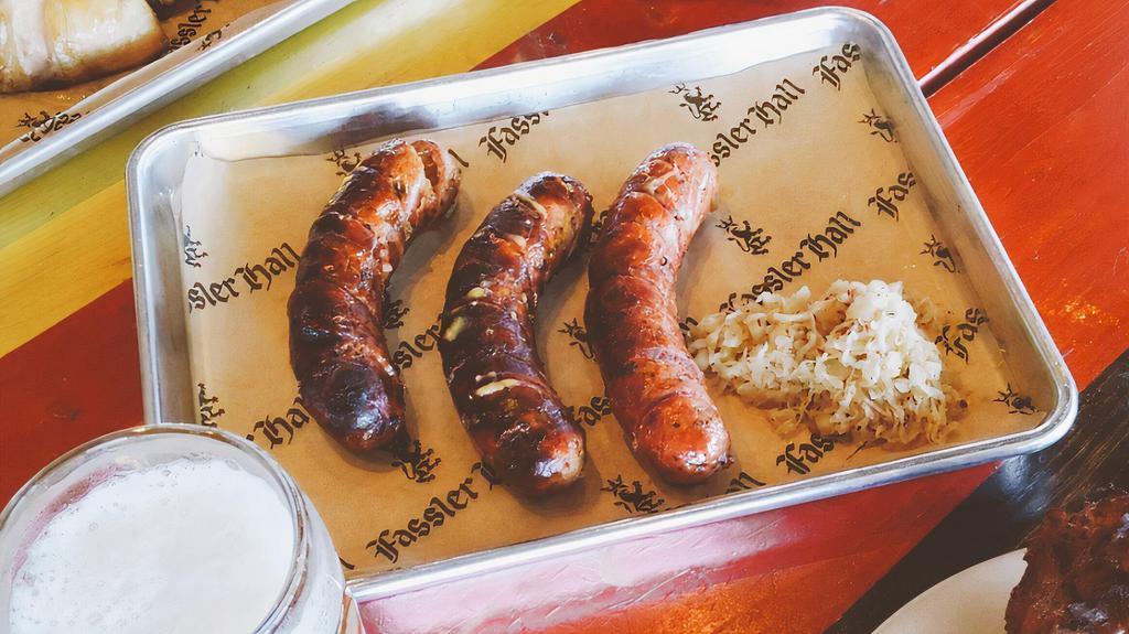 3 Sausage Sampler · Choose three different sausages served scored and plain with a side of sauerkraut and mustard.