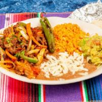 Fajitas · Choice of meat with onions, bell peppers, tomatoes served with rice, beans, guacamole, and l...