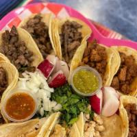 Heart Shaped  Tacos Plate Option 1  · 12 tacos in a heart shaped plate with the choice of three meats!!