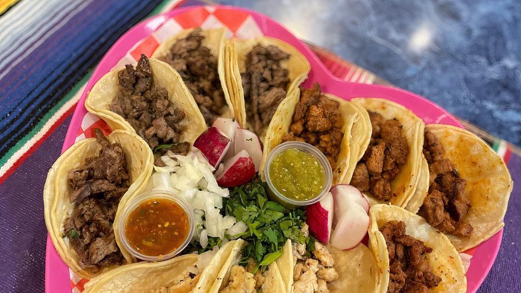 Heart Shaped  Tacos Plate Option 1  · 12 tacos in a heart shaped plate with the choice of three meats!!