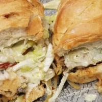 Cajun Chicken · Strips of cajun chicken breast with sautéed mushrooms and onions. Served on a French roll, b...