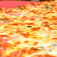Margherita · Fresh dough brushed with olive oil infused tomato sauce and topped sliced tomatoes with fres...