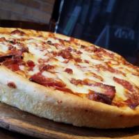 The Porker · Sausage, pepperoni, salami, bacon, and Canadian bacon.