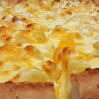 Gouda Mac & Cheese Pizza · Frankie’s smoked Gouda cheese sauce smothered over cavatappi pasta on our homemade dough and...
