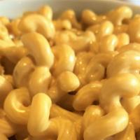 Gouda Mac & Cheese · Cavatappi pasta smothered in Frankie’s homemade Gouda cheese sauce.