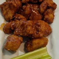 Boneless Wings · Boneless Wings with your choice of either Buffalo, Bourbon BBQ, or Plain. Served with celery...