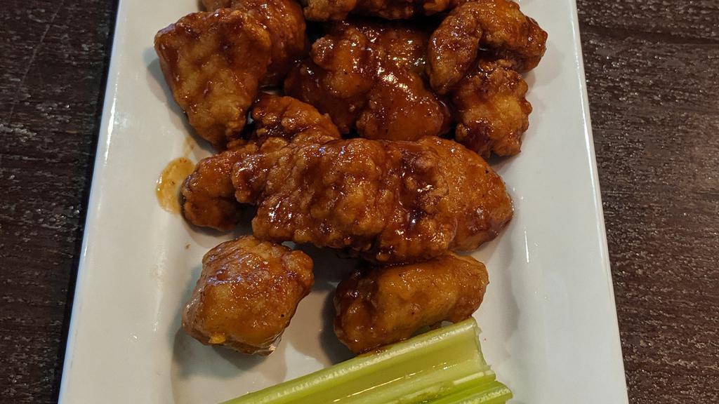 Boneless Wings · Boneless Wings with your choice of either Buffalo, Bourbon BBQ, or Plain. Served with celery and your choice of either blue cheese or ranch.