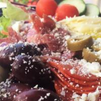 Antipasto Salad · Salami, pepperoni, banana peppers, whole kalamata olives, and feta cheese served on a bed of...