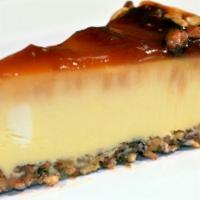 Salted Caramel Cheesecake · Creamy caramel cheesecake baked on a sweet and salty almond crust topped with a thick bed of...