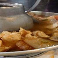 Tom Yum Souppot · A signature Thai soup of straw mushrooms, fresh chilies, kaffir leaves, lemongrass, galangal...