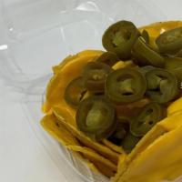 Nachos · Nacho Chips with Cheese and jalapenos