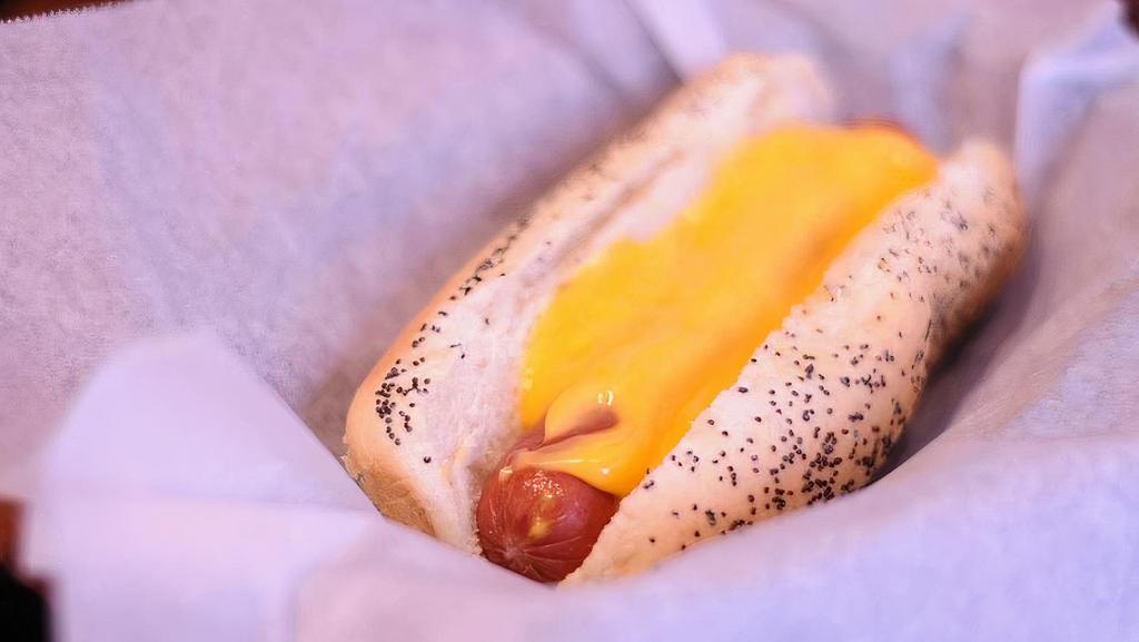 Cheese Dog · Jumbo Hot Dog, Melted cheddar cheese served on steamed poppyseed bun.. (Due to supply chain issues, our vendors have drastically raised their prices. We apologize for the price increases and are hoping this is temporary.)