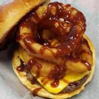 Uptown (Onion Ring Burger) · 1/3 lb Beef Patty, American Cheese, Lettuce, Pickles, Barbeque Sauce, And Onion Rings served...