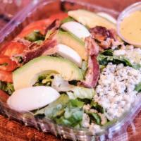 Cobb Salad · Fresh Romaine Salad, Tomatoes, Hard-boiled eggs, Beef Bacon, Avocado, & Blue cheese, served ...