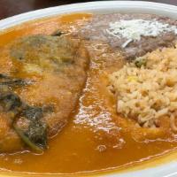 Chile Relleno · Stuffed poblano pepper served with rice and beans.(cheese) with tomato sauce.