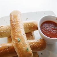 Cheesy Breadsticks · Breadsticks stuffed with mozzarella cheese.