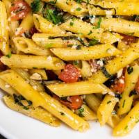 Tomato And Basil · Penne pasta sautéed with garlic. olive oil, tomatoes and basil.