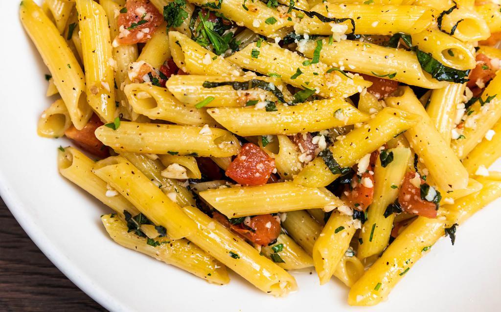 Tomato And Basil Pasta · Served with a roll.