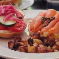 Lox & Bagel · smoked salmon, pickled red onion, tomato, cucumber, capers, dill cream cheese, bagel