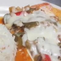 Salmon · Salmon, onions, red and green bell peppers, topped with mozzarella cheese and heavy creme.
