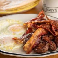 Two Eggs With Meat · Choose from bacon, ham, turkey sausage links, pork maple sausage links or patties with Eggy'...
