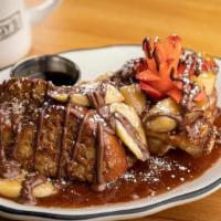 Crunchy Nutella French Toast · Eggy's French toast in a crunchy corn flake batter, stuffed with Nutella, peanut butter and ...