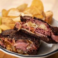 Pastrami Reuben · Classic pastrami with sauerkraut, Eggy's sauce and swiss on grilled marbled rye bread.