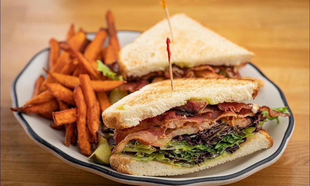 Blt · Bacon, lettuce, tomato and herb aioli on your choice of toasted wheat, sourdough, or marbled rye.