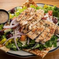 Mediterranean Chicken Salad · Mixed greens with grilled chicken breast, feta, cucumber, tomato, olives, onion and pepperon...