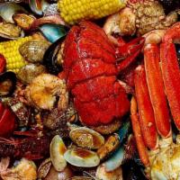 Crab Kitchen Platter · 2 pieces lobster tails, 2 pieces snow crab legs, 1 lb. shrimp head off, 1 lb. crawfish, 1 lb...