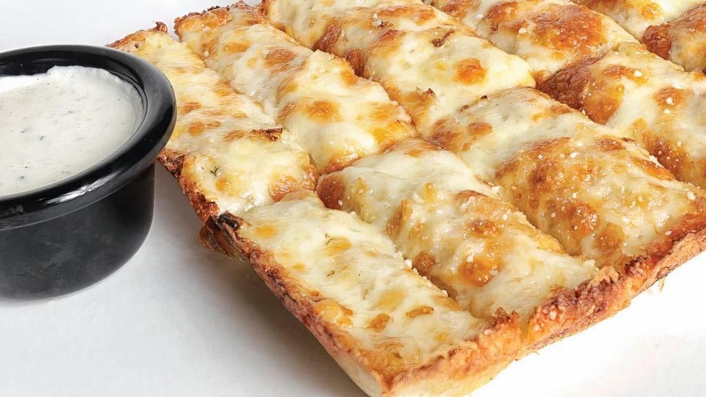 Cheese Bread · Buddy's Original Detroit-Style crust topped with Wisconsin Brick, fontinella, mozzarella and Parmesan cheese.  Served with Buddy's Original Ranch dressing.
