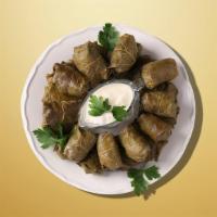Alluring Grape Leaves · Fresh grape leaves are stuffed with mix of rice, fresh vegetables and herbs, served chilled ...