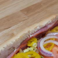 Italian Sub · Ham, salami, pepperoni and provolone cheese.  Topped with lettuce, tomato, banana peppers, r...