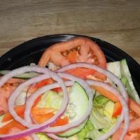 Garden Salad · Lettuce, tomato, cucumber, red onion, red bell pepper.

Choice of Italian, Ranch, or French ...